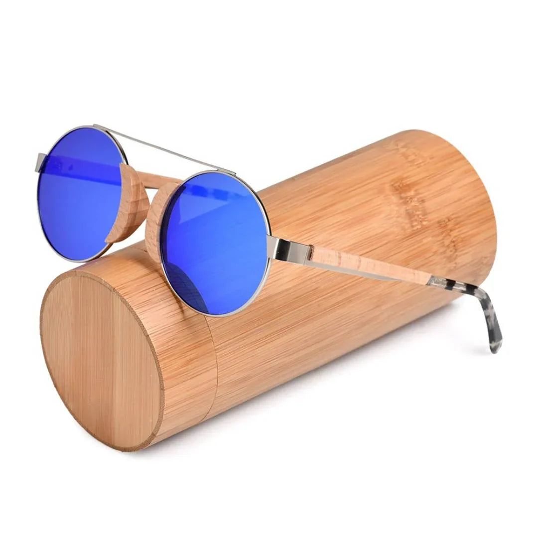 Round blue lens bamboo sunglasses with wooden case on white background