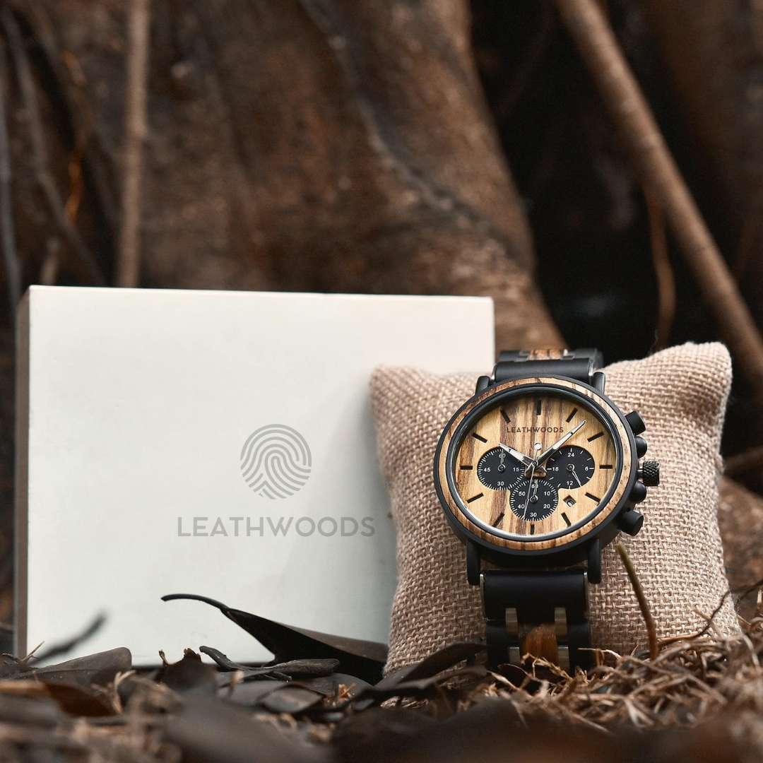 Leathwoods wooden chronograph watch on cushion with branded box outdoors
