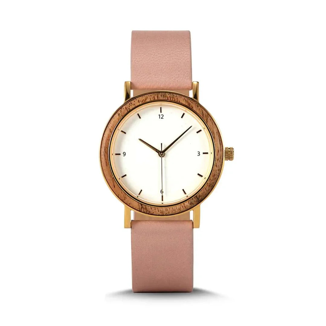 Minimalist women's wristwatch with gold and wood bezel, pink leather band, white dial