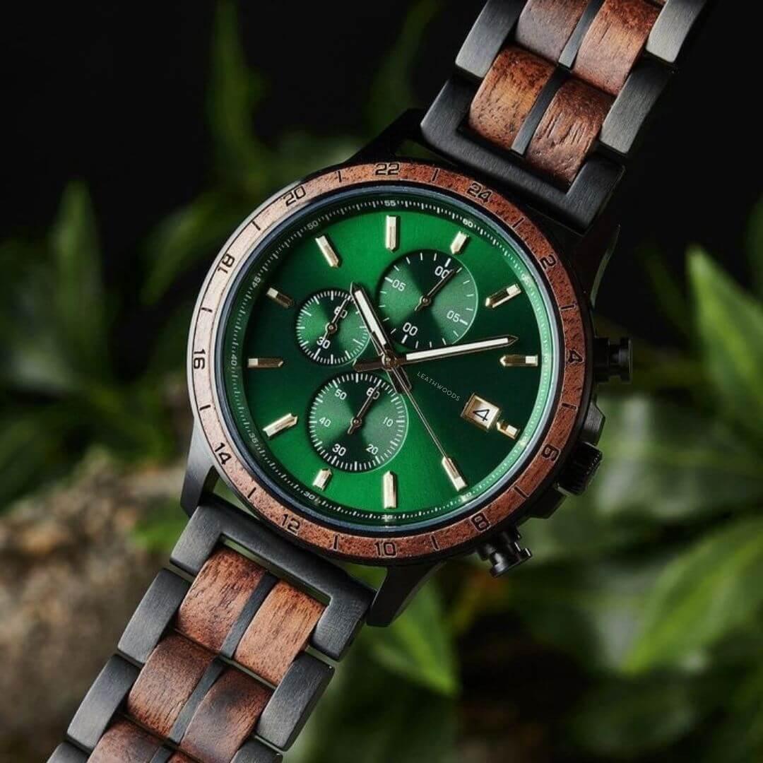 Men's wristwatch with green dial, wood-accented bezel and linked bracelet, chronograph features