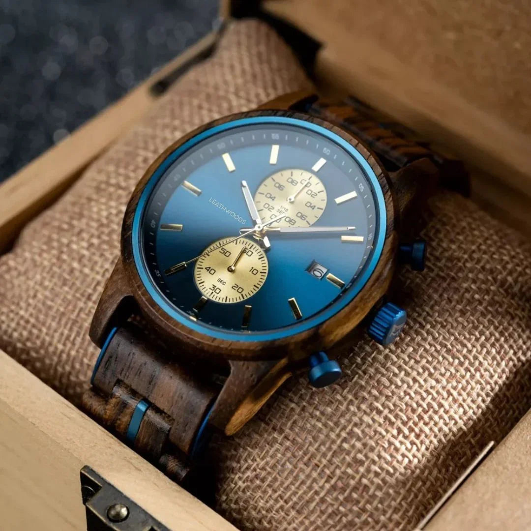 Leathwoods wooden wristwatch with blue dial and gold subdials in a cushioned wooden box
