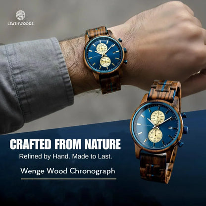 Wooden wristwatch with blue face and gold accents on a wrist, with 'Leathwoods' branding.