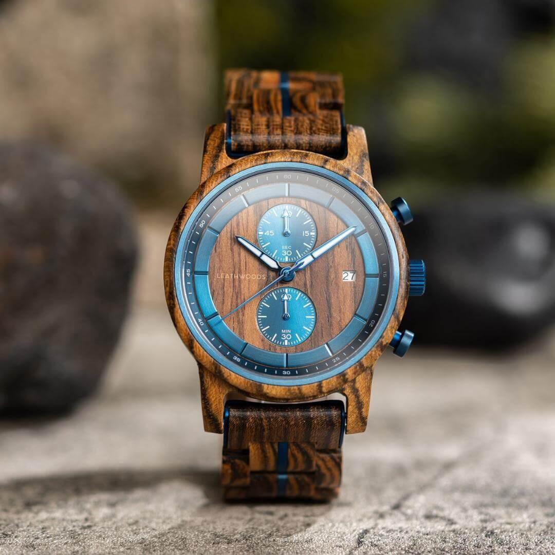 Leathwoods Morpho wooden watch with blue chronograph dials on wood grain strap outdoors